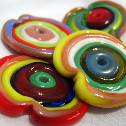 I'm a lampwork bead maker, jewelry, and many other crafts.