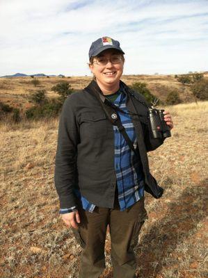 Birder who wears flip-up sunglasses. on staff for Tucson Audubon Society and co-coordinate the Arizona Import Bird Areas program and run the Tucson Bird Count.