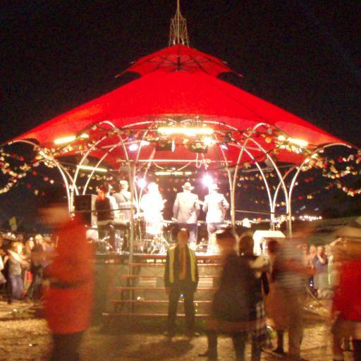 Small stage in markets area near the Cider bus,bringing you an eclectic line up of all-sorts musicish and walkabouty, An Oasis in Babylon central.