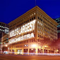 The worlds Largest Orchestra is one conductor conducting musicians around the city, the country and the world - ALL PLAYING IN UNISON