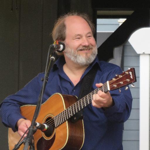 Flatpicking an original elixir of feel-good Americana infused with Blues, Grass, & Soul.