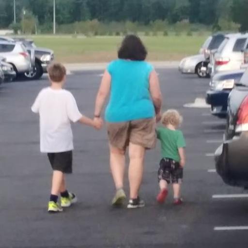 Mommy of 2 two-legged, 3 four-legged children, 2 hermit crabs and a fish.