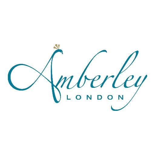 Elegant designer girls clothes by luxury childrenswear brand Amberley London - classic European style occasion, party, day and play dresses for ages 1 to 12.