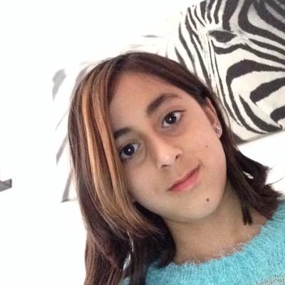 Hi my name is Amina Liza Ahmed! I'm turning 11 on August 14! I love the vampire diaries and cats and you tell me the rest!!!!