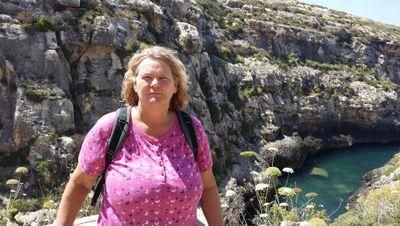 crime writer, works in criminal justice system, mother, grandmother.