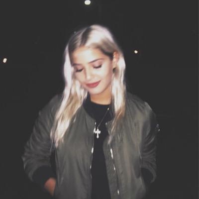 she got the devil look but she has the soul of an angel.