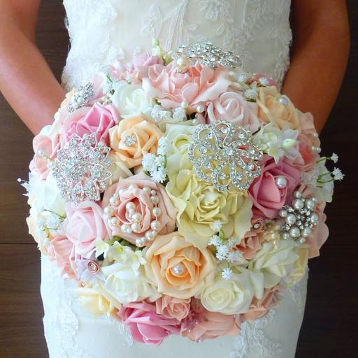 I design and make bespoke bridal bouquets using silk & foam flowers as a compelling alternative to traditional flower bouquets. Visit my site. Thanks Anna x