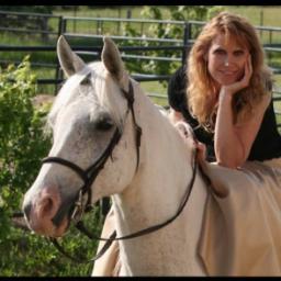 is a novelist, equestrian, environmentalist, and child of God.
