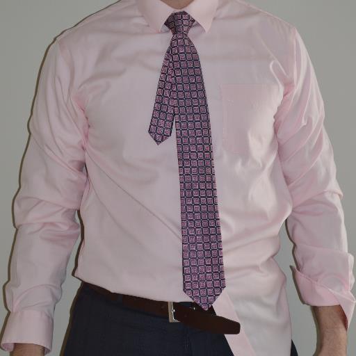 The Tail Grabber is an innovative and invisible device that cures the wandering tie tail without using a common tie clip.