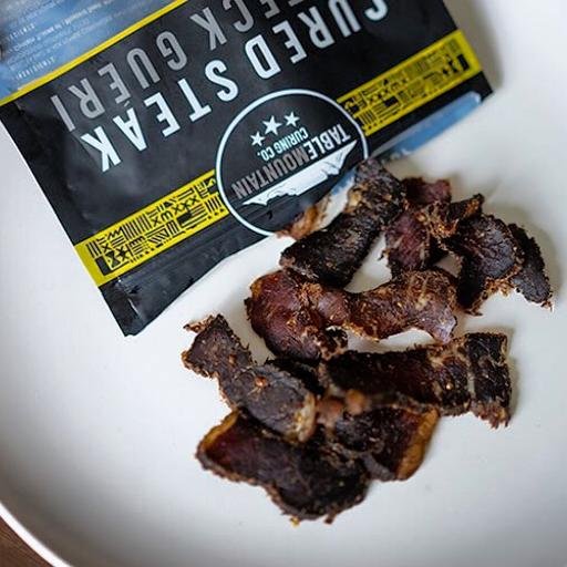 Changing the beef jerky game one day at a time. South African Biltong with a twist. Nitrate free, gently spiced beefy candy for any occasion! #tastefromthetop