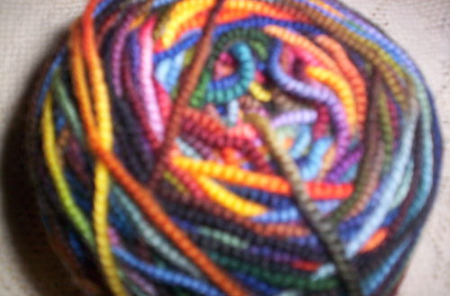 Ponders yarn, and pattern stitches, often. Knits, when she can decide on both... and writes with too many commas.
