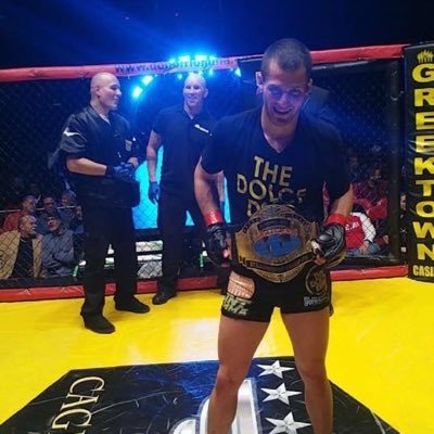 zachjrini92's profile picture. jacked and tan fight team 145