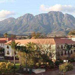 Graduate School of Economic and Management Sciences at Stellenbosch University. Pushing boundaries in doctoral education in E & M sciences. Own views only.