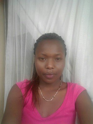 A SIMPLE LADY,CARING N LOVES MAH SELF MUCH
