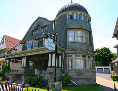 The Bundy Arts & Victorian Museum, located in the former home of Mr. Harlow E. Bundy.