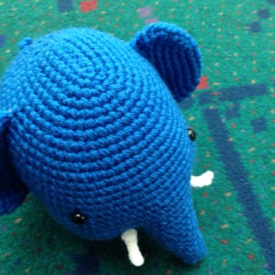 I am a crochet elephant from Portland, Oregon, that attends PostgreSQL events. I am always looking for new places to live.