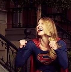 Super girl with flash and a flash light to give light to those in the dark. No one can let us down cause our superhuman energy is from the Most Powerful Creator