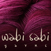 hands of Poppy Flower Fibers and Wabi Sabi Yarns. fluffy on the outside, crunchy on the inside.