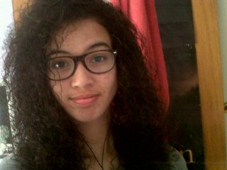 InCaylable's profile picture. That writer girl with the wild curly hair and epic tales.