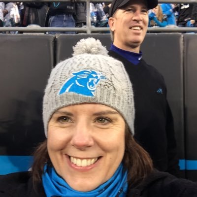 Real women love football! This woman loves her Carolina Panthers!