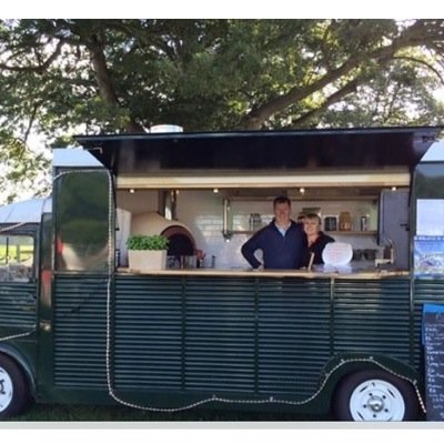 Pizzas cooked in our wood fired oven  from our vintage Citroen hy van ,catering for festivals,events,weddings, corporate,etc.facebook rocket woodfired pizza