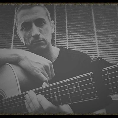 Singer song writer, poet, guitarist, photographer, artist.