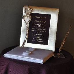 Frame an Engraved an Invitation in the color of brass of your event.