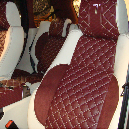 We are a custom automotive interior shop. Our interiors have won awards at major shows and have been featured in magazines.