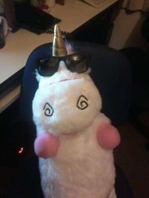 Unicornio con lentes Profile