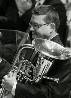 Bombardí solista de la Banda Municipal de Barcelona 
Membre de Projecte 4 trombons 
Fundador de Barna Brass Quintet