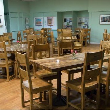 the cafe is located in the heart of Lancaster castle and has plenty of lawned outdoor space. The 'inside' is actually the former HM Prisons' visiting room.