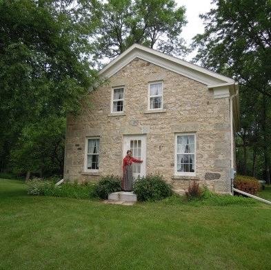An 1848 Greek Revival style house @ 13615 N Cedarburg Rd in Mequon, WI. The fieldstone w/limestone front bldg is on the National Register of Historic Places.