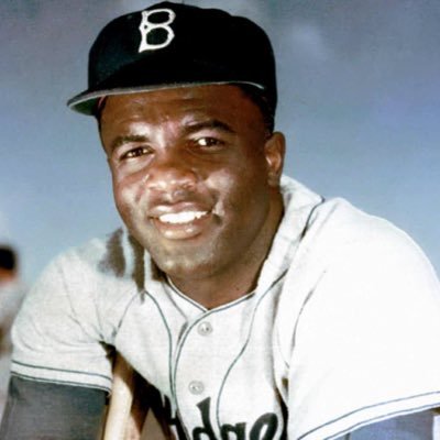 Baseball player. Family man. Just trying to make it as the first African American in the major leagues.