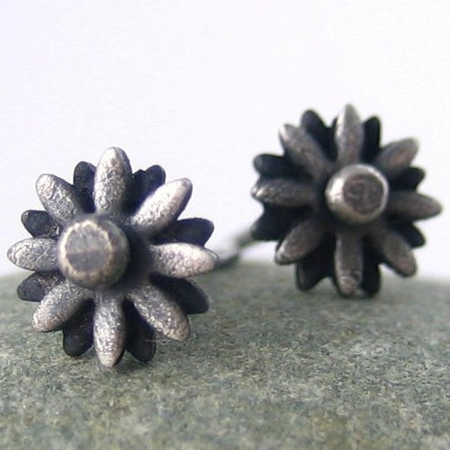 shizendesigns's profile picture. I am a maker of things that are tiny and shiny.