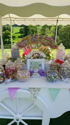 Local business. Traditional sweet cart for hire for all your special occasions.