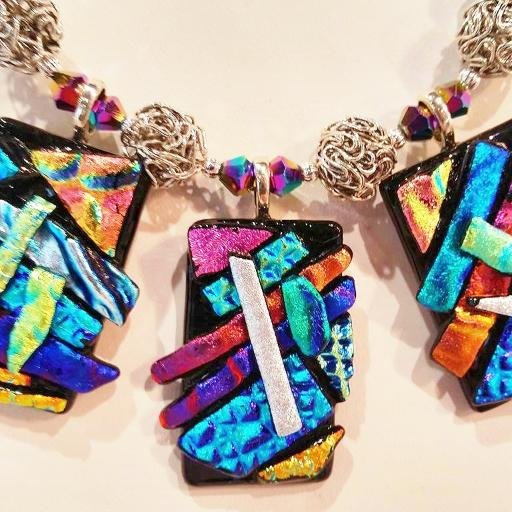 Hand-made dichroic glass jewelry and many more fun designs! Fresh. Stylish. One of a Kind.