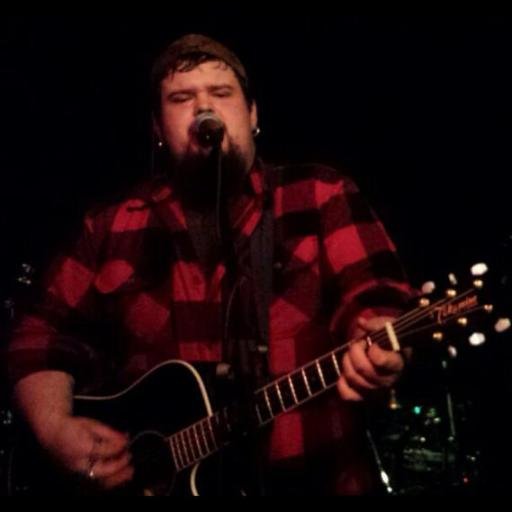 Chasing them dreams pullin' on a six string