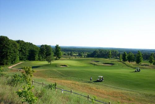 Champion Hill is a scenic 18 hole golf course in Beulah, MI. It’s known for its open, rolling, heather-lined fairways and distant views of Lake Michigan.