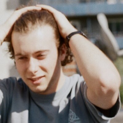 bakerkretzmar's profile picture. a person with a heart and fingers who uses the internet