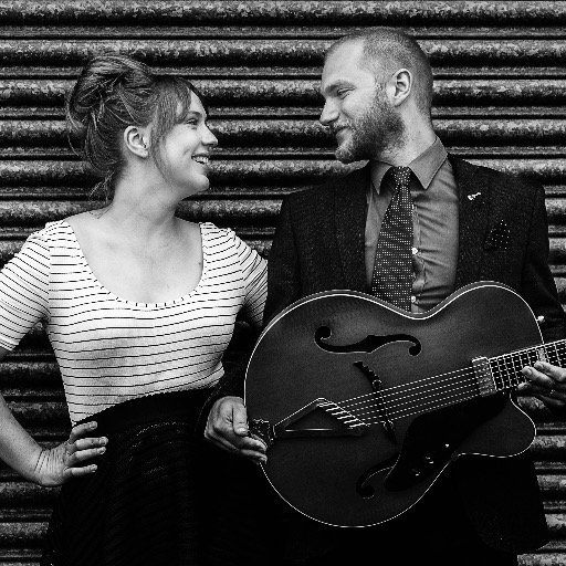 Comprised of sleek female vocals and a fingerstyle guitar accompaniment, Canary & The Cat perform retro renditions of popular songs. Parties | Weddings | Venues