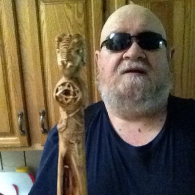 Blind woodcarver that loves his wife and beautiful guide dog