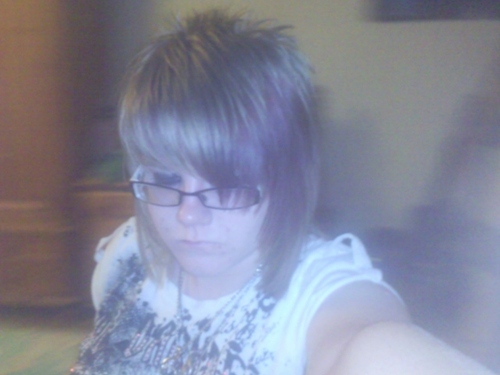 Hey im 16 :P im pretty much always hyper lol =) im trying to teach myself how to play guitar, im into most music but mainly screamo and rock yeaah...