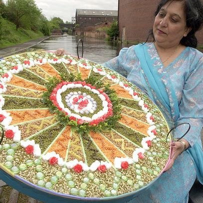 With over 30 years experience Ranbir is recognised as the UK's leading Rangoli & Textile Artist, with her work exhibited thought the UK.