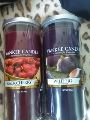 Loves Robbie Williams and I am a Yankee  candle addict.