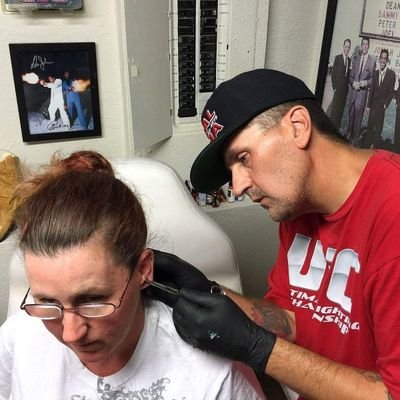 PIERCER AT MILD 2 WILD TATTOO & BODY PIERCING IN LAS VEGAS NEVADA!