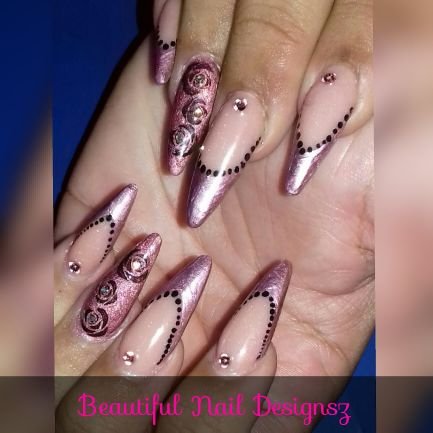 Dangel_Nails's profile picture. Beautiful Nail Designs & Co primarily offers nail care services such as manicures, pedicures, and nail enhancements.