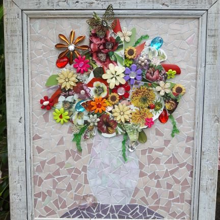 I make mosaics made from traditional  tesserae and up cycled objects and china. I love walking my Cockapoo on the beach and searching for shells and drift wood.