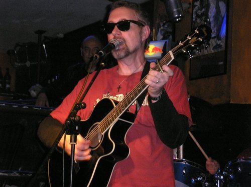 Singer/song writer/guitarist, fiction writer and slayer of zombies; smell ME, America!