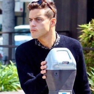 rami malek looking suspicious: a collection