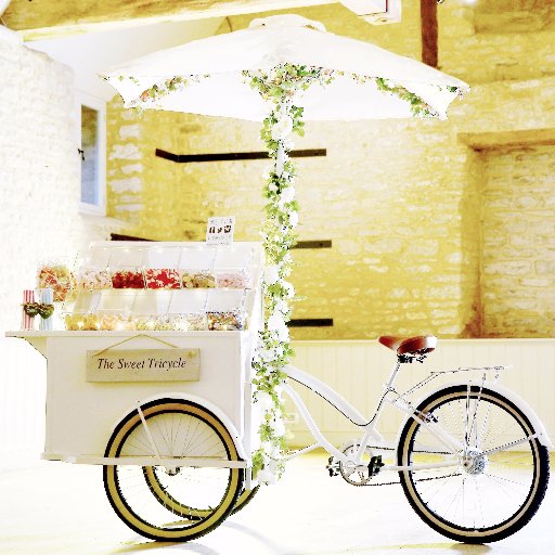 The Sweet Tricycle provides Sweets, Prosecco, Pimms & Hot Chocolate. 
This beautiful tricycle adds a sprinkle of sparkle to any special event.